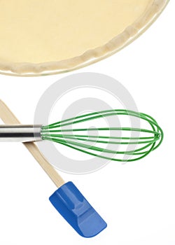 Uncooked Pie Crust with Kitchen Tools