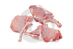 Uncooked pork loin chops with frenched ribs photo