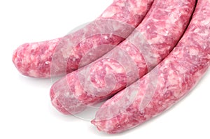Uncooked pork meat sausages