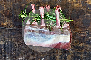 Uncooked rack of lamb with rosemary