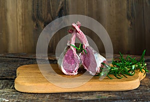 Uncooked rack of lamb with rosemary