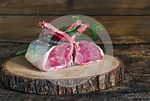 Uncooked rack of lamb with rosemary