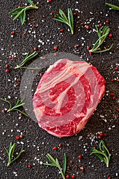 Uncooked rib eye steak