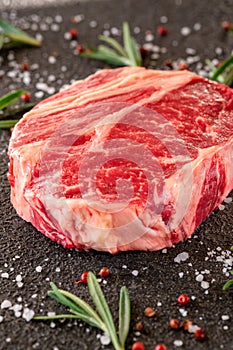 Uncooked rib eye steak