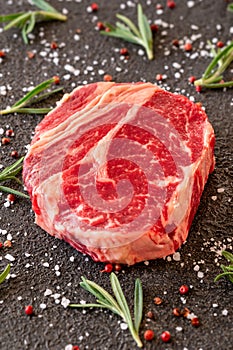 Uncooked rib eye steak