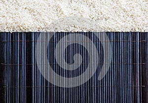 Uncooked rice and Platemat textures background