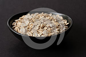 Uncooked Rolled Oats in a Bowl