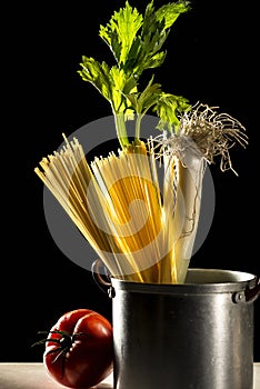 Uncooked spaghetti in a pot