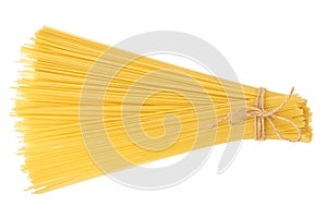 uncooked spaghetti or yellow pasta isolated on white background. Top view. Flat lay