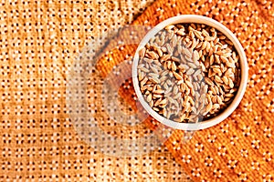 Grains of spelt in bowl