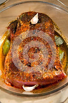 Uncooked spiced pork roast