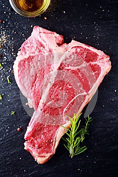 Uncooked t-bone or porterhouse steak