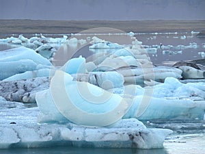 Uncountable Blue Icebergs Floating on Jokulsarlon Glacier Lagoon, Iceland