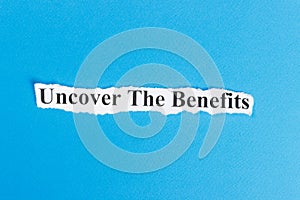 Uncover The Benefits text on paper. Word Uncover The Benefits on torn paper. Concept Image