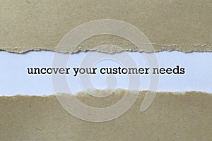 Uncover your customer needs word on paper