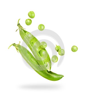 Uncovered pea pod in the air on a white background