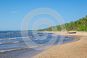 Uncrowded summer beach on the shores of the cold Baltic Sea