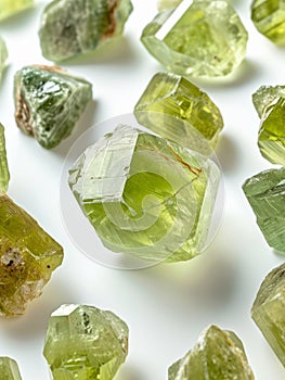 Uncut green chrysolite stones. photo