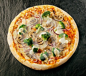 Uncut savory broccoli and mushroom Italian pizza