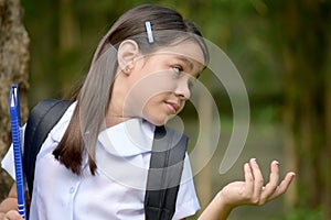 Undecided Child Girl Student With Books