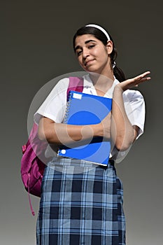 Undecided Colombian Student Teenager School Girl Wearing School Uniform With Notebook