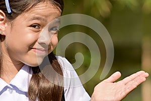 An Undecided Female Student With Notebooks