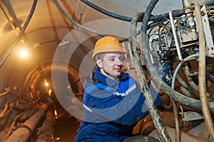 Undeground working in tunnel. sewer collector installation