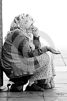 An undentified female muslim begger