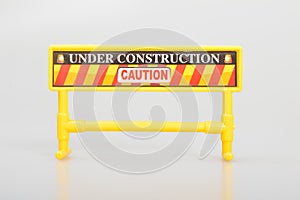 Under construction barrier isolated on a white background