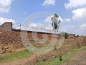 Under construction building on beautiful landscape with scenic Cloud