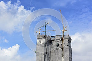 Under construction building with the crane