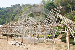 Under construction building with wood and bamboo in nature