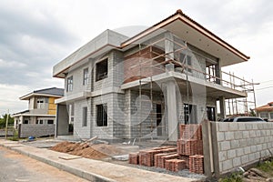 Under construction house with modern design and concrete blocks photo