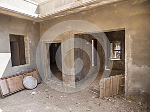 Under construction old abandoned ruined broken house in village town rural area in india.