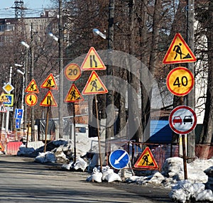 Under construction - Road signs along street