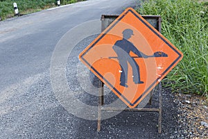 Under construction sign on damage road