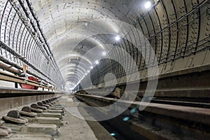 Under construction subway tunnel of reinforced concrete tubes