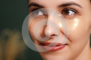Under eye masks for puffiness, wrinkles, dark circles. Eye patches concept. Close-up portrait of her she nice