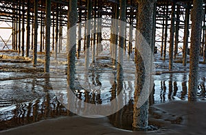 Under the Pier. Cast Iron piles. Central Pier, Blackpool, Lancashire, UK