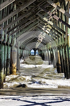 Under the pier at Folly Beach in Charleston South Carolina
