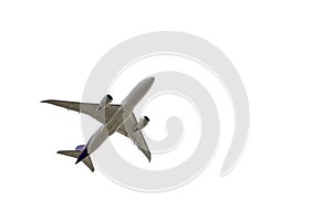 Under view of airplane for commercial passenger or cargo transportation flying isolated on white background with clipping path