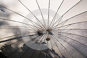 Under white umbrella