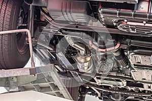 Underbody of an off-road vehicle , SUV or off-road vehicle shows automotive engineering in detail with wheel suspension, exhaust photo