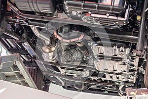 Underbody of an off-road vehicle , SUV or off-road vehicle shows automotive engineering in detail with wheel suspension, exhaust photo