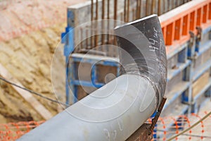 Undercooked weld butt covered with slag. Piping during manual arc welding using an electrode