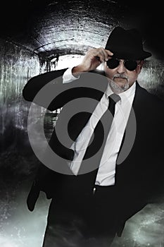 Undercover detective man in sunglasses photo