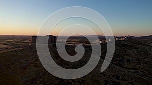 Underexposed video at sunrise of the Castle of Consuegra with the famous windmill from Consuegra