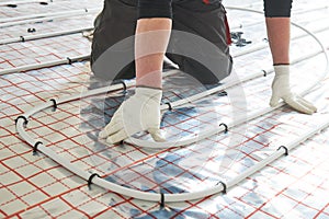 Underfloor heating installation. Warm floor heating system