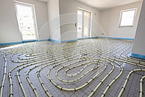 underfloor heating system in construction of new built residential home.