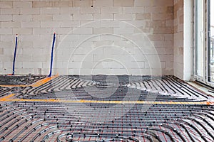 Underfloor heating system installation in new house